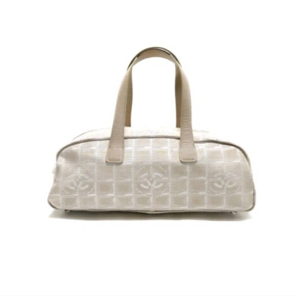 **HOST PICK ** Authentic Chanel Travel Line Handbag in Beige
